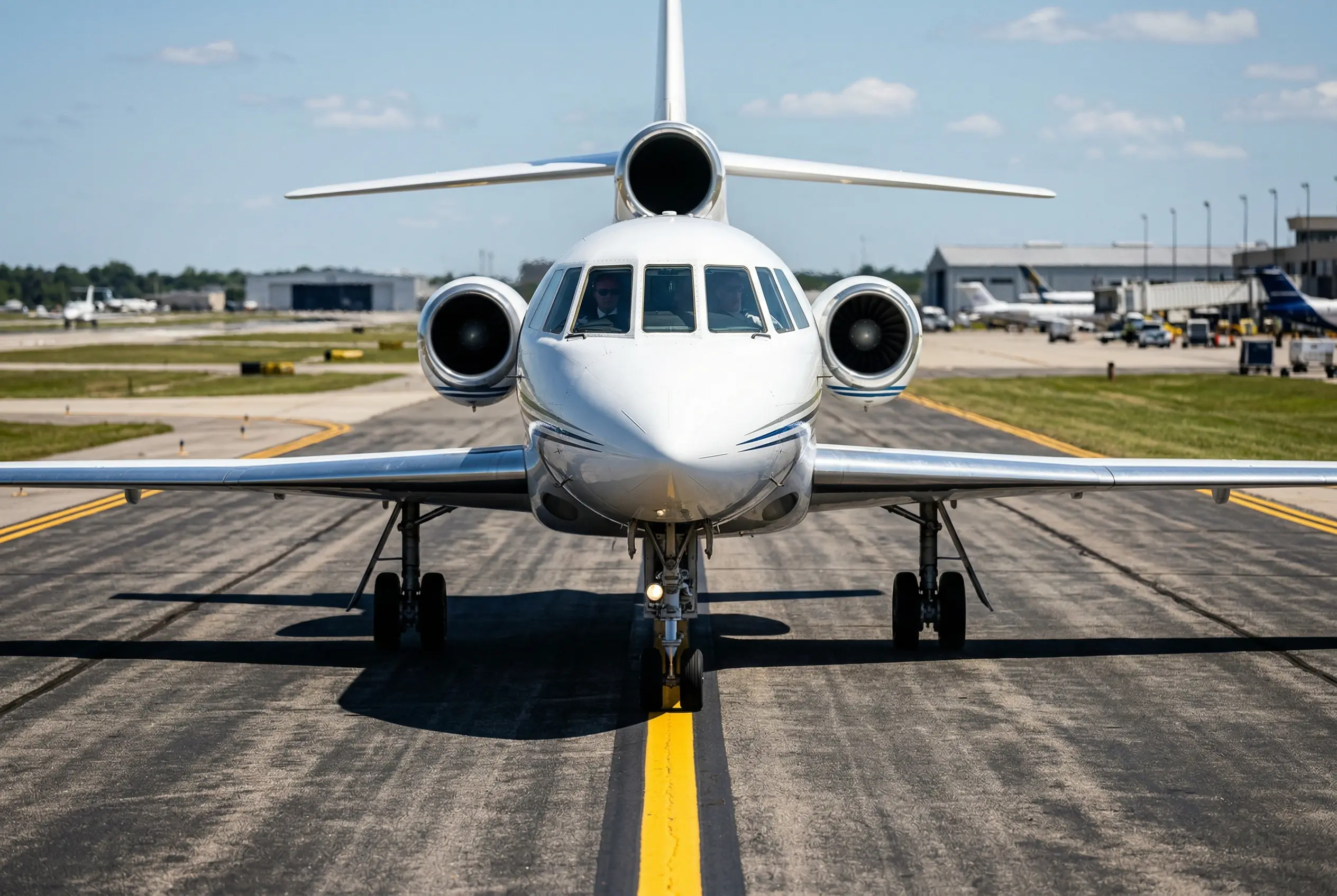 Dassault Falcon 50 trijet parked on the ramp at a private terminal